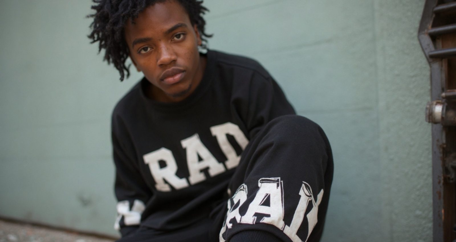 black_person_wearing_top_and_bottom_streetwear-6